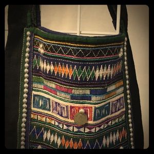 Handmade shoulder bag.